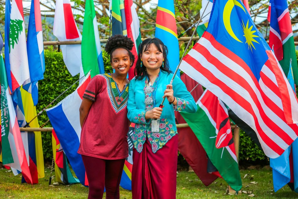 Students waving flags