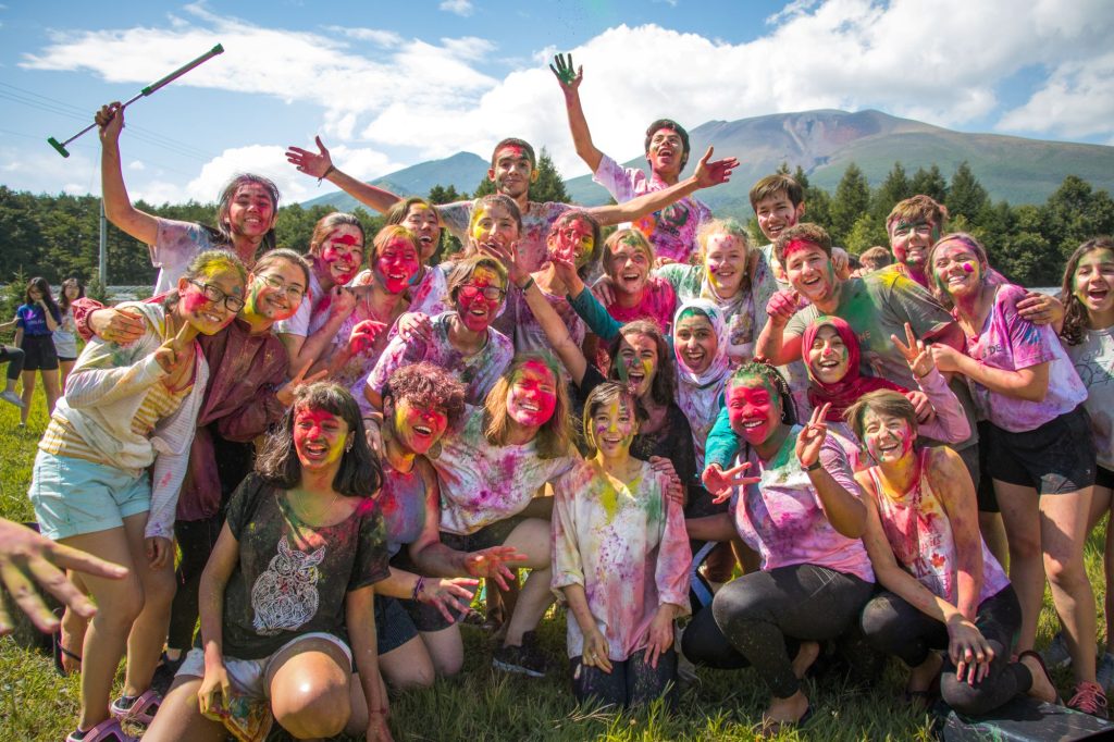 Students celebrating Holi festival.