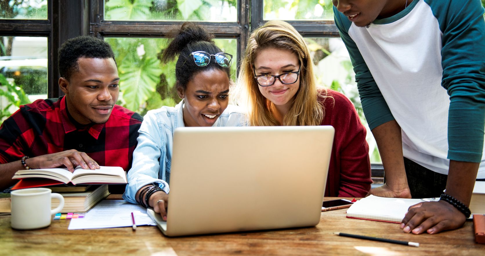 Students working together at a desk